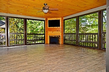 Enclosed Porch with TV and Fireplace