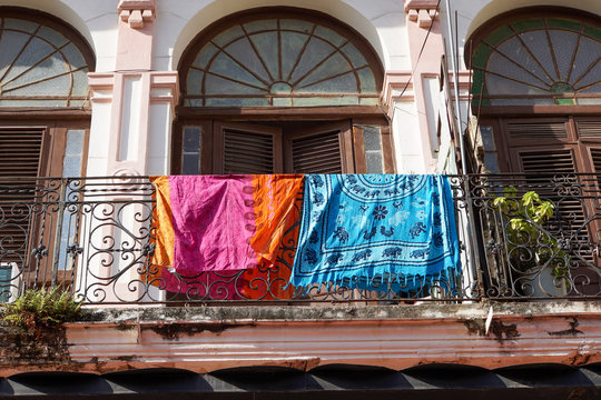 cuban balcony  with laundry in havana, cuba