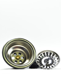 Navel sink stopper placed on a white background.