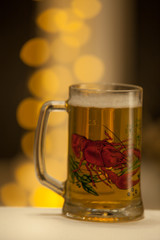 Mug of beer on wooden background