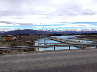 A salmon farm and Mount Cook
