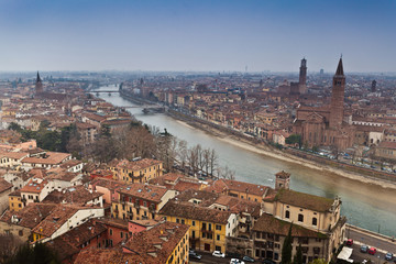 Fototapeta na wymiar Panorama of one of the most romantic cities in Italy and the world - Verona, view of the city and the Adige river, places of romantic history of Romeo and Juliet