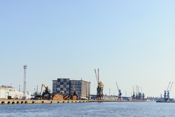 Fototapeta na wymiar Port of Szczecin. Harbor buildings in northern Poland. Season of the spring. Odra river.