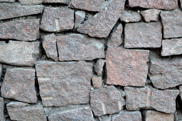 Granite brick wall close up