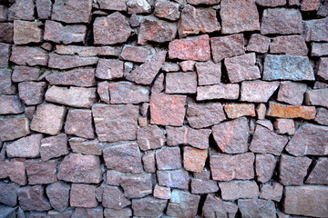 Granite brick wall close up