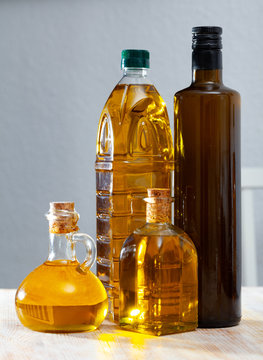Vegetable oil in decanters and bottles