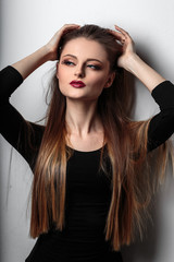 Fototapeta premium beauty portrait of young woman with fashion makeup and fantasy eyelashes