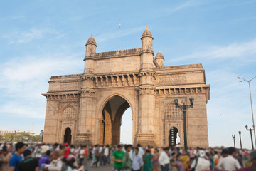Fototapeta na wymiar People at Gateway of India, Mumbai's tourist district and most famous landmark