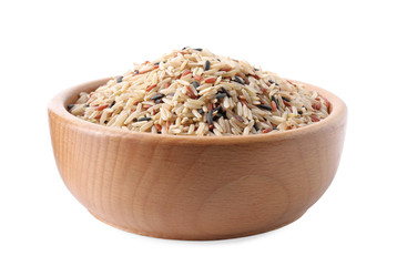 Mix of different brown rice in wooden bowl isolated on white