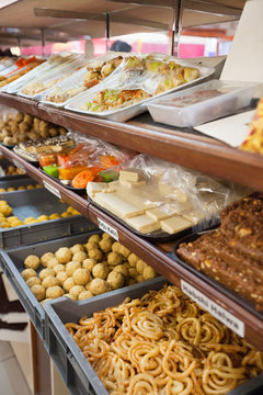 Variety of Indian sweet food displayed at store