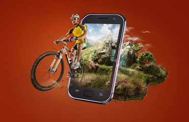 Sport. Cyclist riding a bike on an open green road on the sunset through the smartphone. 3d...