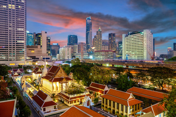 Wat Pathumwanaram Temple in the morning, view from Siam Paragon car park in Bangkok, Thailand.