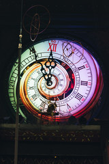 Naklejka premium Vintage wall clock with lighting in circus