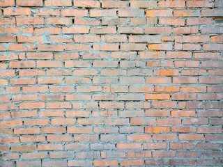 Background of orange brick with the old cement