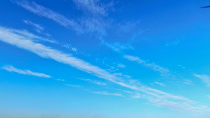 Naklejka na ściany i meble Ozone layer. Blue sky with white clouds.