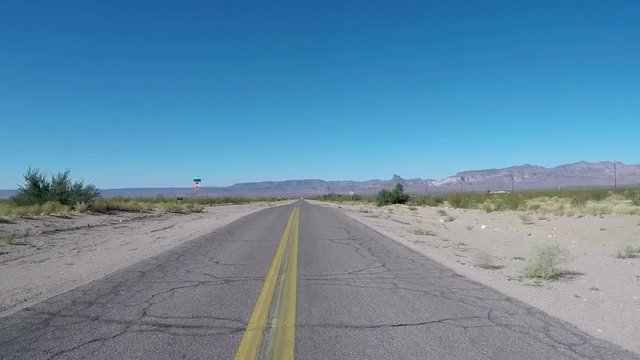 Route 66 Oatman Highway on original pavement through the lonesome and hot desert of Arizona. Includes three different video sequences!