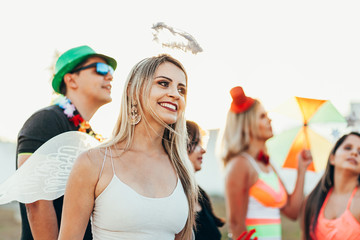 Brazilian Carnival. Group of Brazilian people in costume celebrating the carnival party in the city