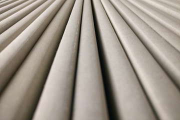 Texture of long parallel lines, gray background