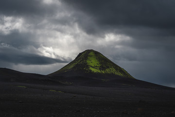 Single black stone mountain on the Laugavegur trek in Iceland