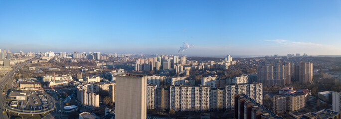 Panoramic view from drone of city landscape with buildings.