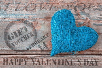 Obraz na płótnie Canvas Blue Heart and Happy Valentines Day Gift Voucher