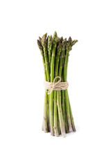 Bunched asparagus isolated on white background. Asparagus with copy space for text on white. Fresh green spring vegetables on a white background. Edible Asparagus Sprouts.