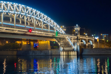 Naklejka premium Russia.Saint Petersburg.Peter the Great Bridge at night. Bolsheokhtinsky bridge in the night lights. Drawbridges of St. Petersburg.Canals of Saint Petersburg. Cities of Russia. Traveling in Russia