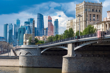 Obraz premium Moscow. Russia. View of Moscow City. Borodino bridge. Tours on the Moscow River. Cities of Russia. Skyscrapers of the capital. Travel in Russia. Architecture of Russian cities. High-rise buildings