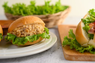 A hamburgers placed in white dish beautifully