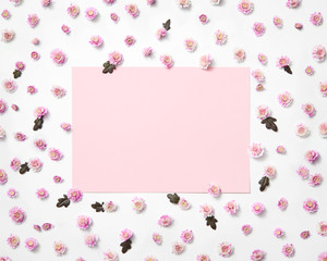 Flowers frame with light pink square for greeting.