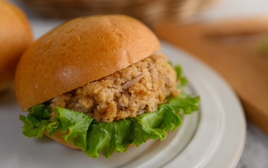 Close up hamburgers placed in white dish beautifully