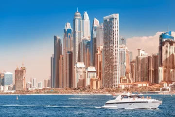 Foto auf Acrylglas Cityscape view of Dubai skyscrapers - hotels and apartment buildings. Real estate in Persian Gulf concept. Elite resort in United Arab Emirates © EdNurg