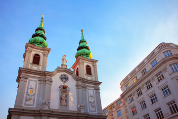 Fototapeta na wymiar Stiftskirche church building in Neubau district in Vienna