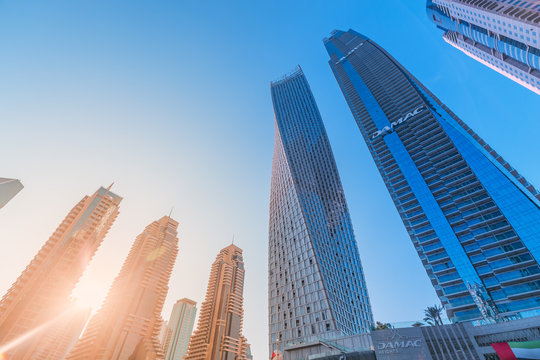 29 November 2019, UAE, Dubai: Infinity Tower and Damac Heights Tall skyscrapers buildings in Dubai Marina at sunset