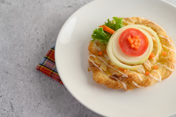 Appetizing with Almond twist bread on white dish