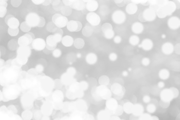 Abstract background with White bokeh on gray background. christmas blurred beautiful shiny Christmas lights.
