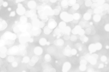 Abstract background with White bokeh on gray background. christmas blurred beautiful shiny Christmas lights.