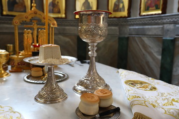 The altar of the Orthodox Church. Prosphora, Prosper, Church Bread, Holy Communion, Icon, on the throne of the Orthodox Church