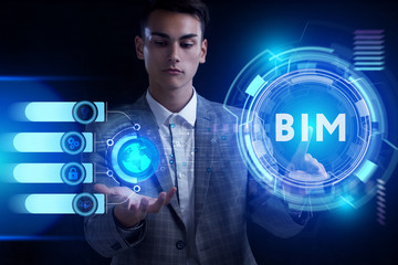 Business, Technology, Internet and network concept. Young businessman working on a virtual screen of the future and sees the inscription: