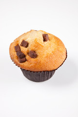Freshly baked muffin over white background