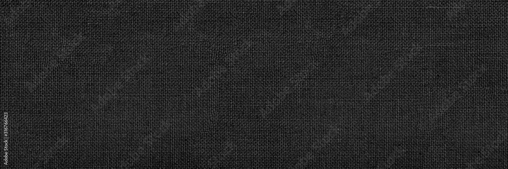 Wall mural panoramic close-up texture of natural weave cloth in dark and black color. fabric texture of natural