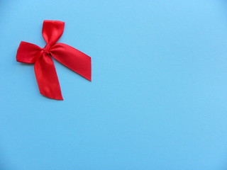 red bow on a blue background