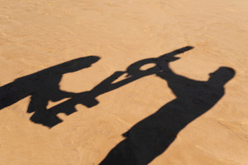 shadow of letters forming the word love.