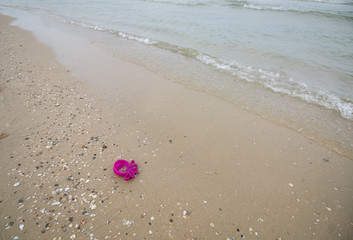 plastic on sand beach background
