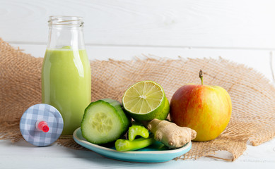 Detox smoothie with ginger, cucumber, apple and lemon.