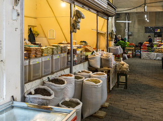Counter with loose spices in the market in the old part of Kutaisi in Georgia