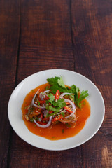 Canned Sardine Salad with tomato sauce in white dish