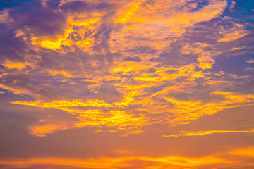 Colourful majestic sunset sky with cloud on sea shore wide angel len