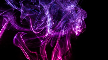 Colored smoke on black background