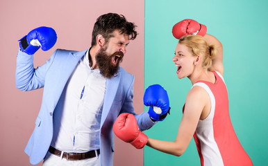 family couple boxing gloves. problems in relationship. sport. bearded man hipster fighting with...